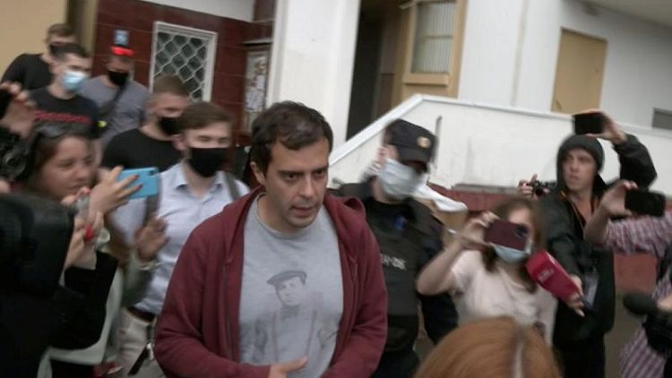 Editor who investigated Navalny poisoning says Russia declares him wanted man