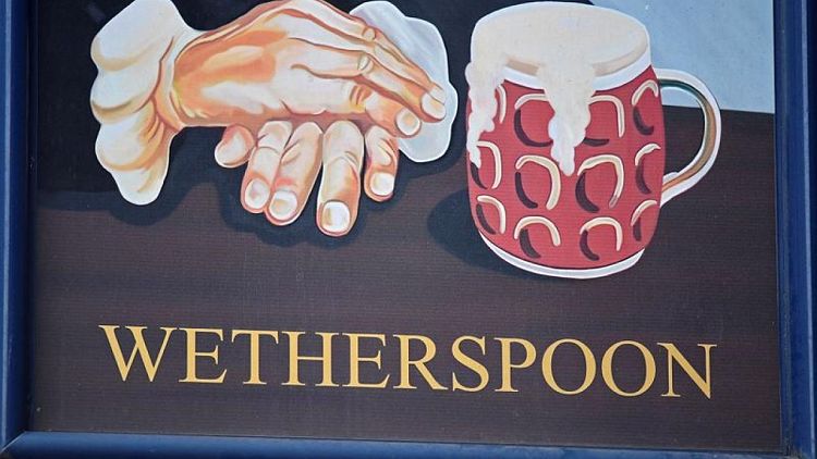 Annual loss at UK pubs group Wetherspoon balloons due to pandemic curbs