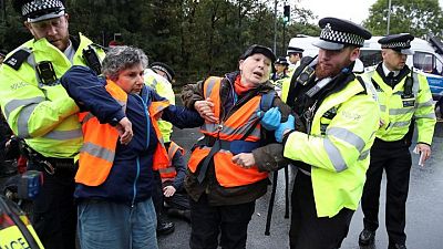 British police arrests 13 climate activists who blocked Heathrow airport access road British police arrests 13 climate activists who blocked Heathrow airport access road