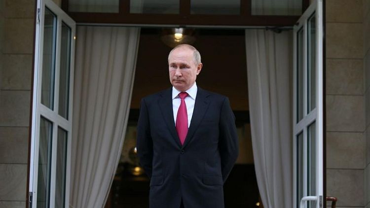 Putin seeks to rein in 'rainy-day fund' spending as energy transition looms