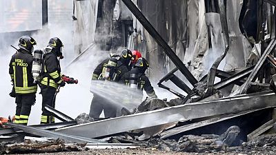 Small plane crashes into empty building outside Milan, all 8 onboard die Small plane crashes into empty building outside Milan, all 8 onboard die