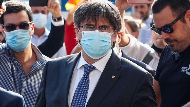 Supporters chant 'freedom' at Catalan leader's extradition heading