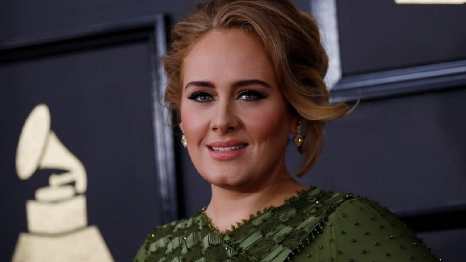 Adele tops UK music charts record-breaking comeback album "30"