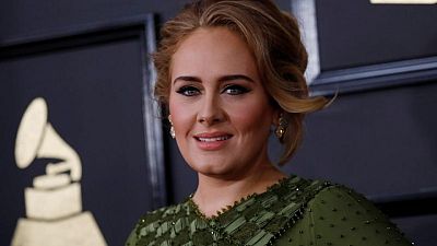 Adele tops UK music charts record-breaking comeback album "30"