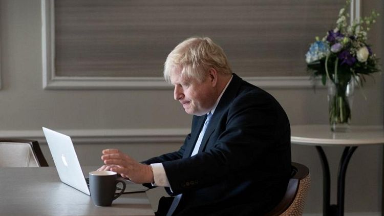Under fire, UK PM Johnson tries to return to election agenda