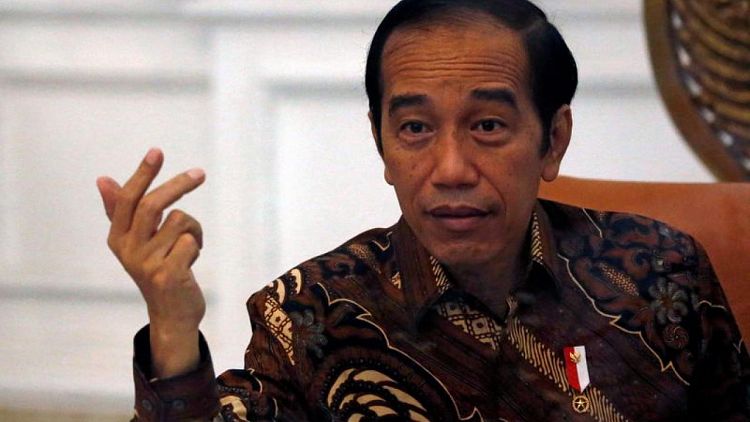 Indonesia president backs amnesty for professor jailed for WhatsApp message