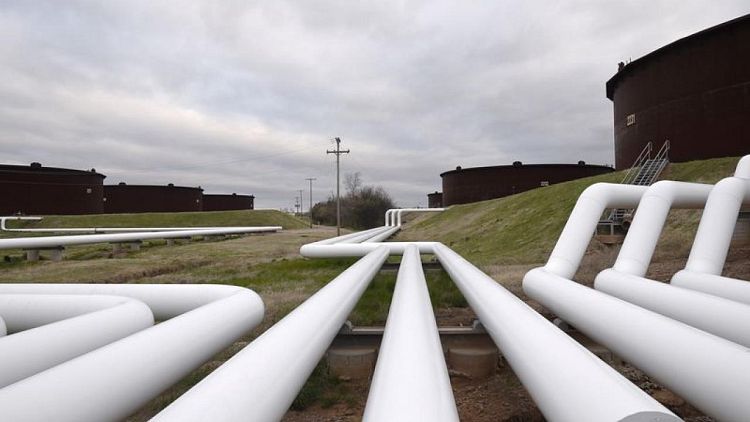 Oil gains as energy demand rises; WTI tops $80