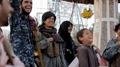 Battle-hardened Taliban fighters enjoy a day off at amusement park Battle-hardened Taliban fighters enjoy a day off at amusement park