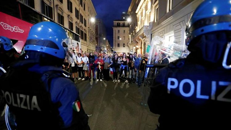 Italian police arrest far-right party officials after anti-vax riot
