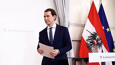 Austria's ruling coalition soldiers on after fight to near-death Austria's ruling coalition soldiers on after fight to near-death
