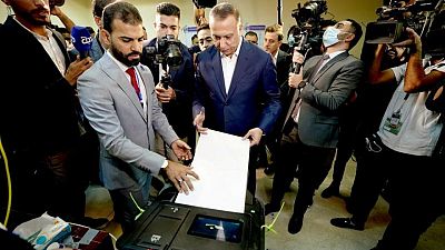 Iraqis vote in parliamentary election as some stage boycott in test for democracy