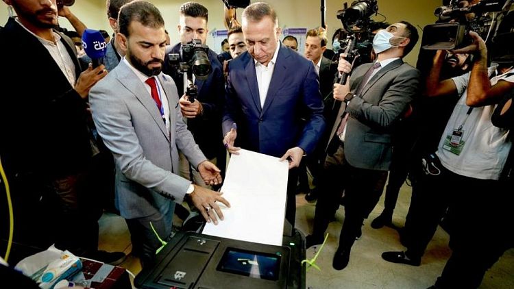 Iraqis vote in parliamentary election as some stage boycott in test for democracy