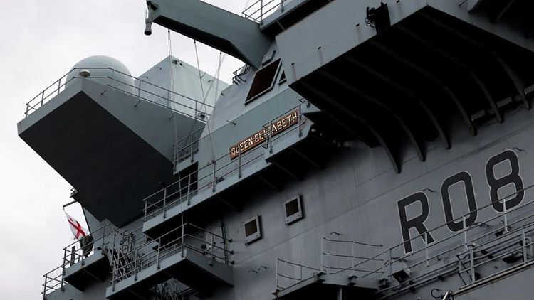 Britain reaffirms Asia 'tilt' as new warship makes Singapore stop