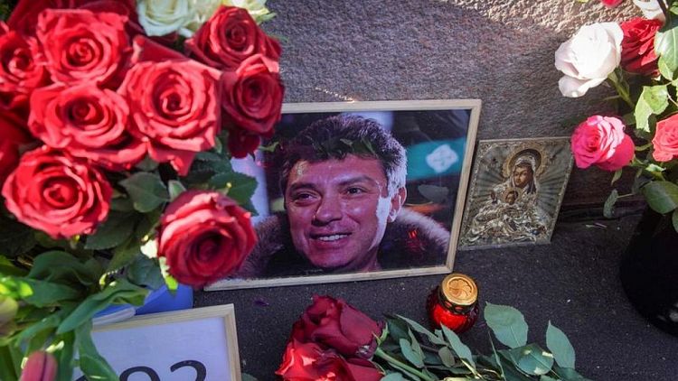 Russian nationalists ransack slain Kremlin critic's memorial to protest U.S. visit