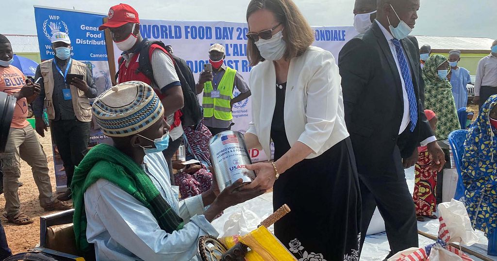 U.S. Embassy Chargé d'Affaires and USAID Country Representative participate in food distribution to commemorate World Food Day - Vimarsana News