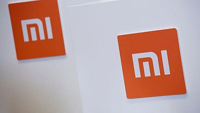 Xiaomi to mass produce its own cars in H1 2024 -executive Xiaomi to mass produce its own cars in H1 2024 -executive