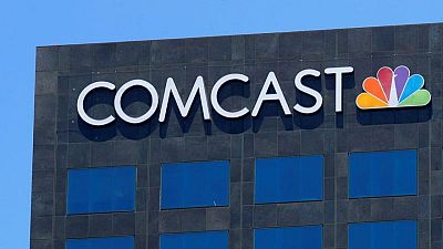 Comcast, Walmart team up to sell smart TVs with the media firm's software