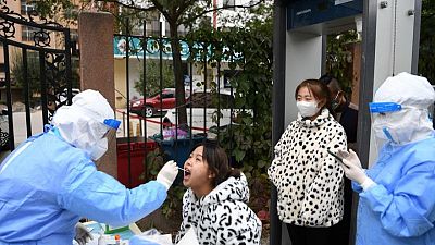 Parts of China toughen COVID curbs to fight new outbreak