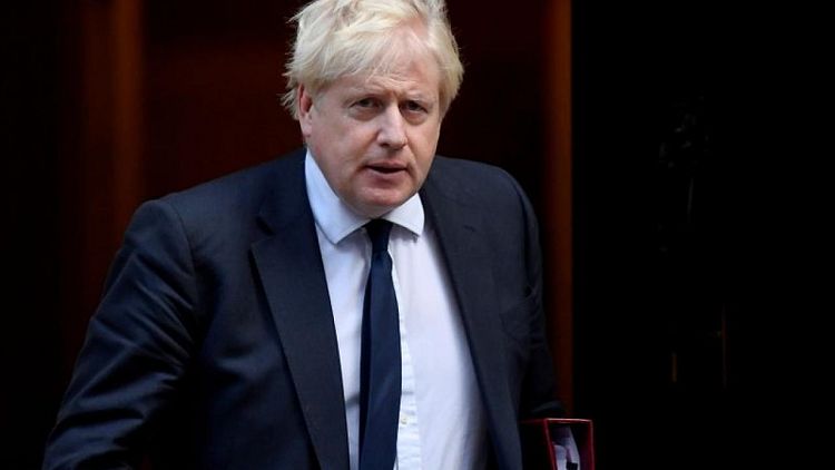 UK's Johnson warns Brussels over speed of N.Ireland talks