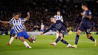 Soccer-Foden double inspires Man City to 4-1 win at Brighton