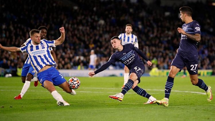 Soccer-Foden double inspires Man City to 4-1 win at Brighton