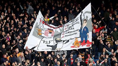 Soccer-Police say no offence caused by banner at Palace critical of Newcastle deal