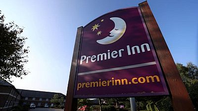 Premier Inn owner eyes full UK recovery in 2022 as losses narrow