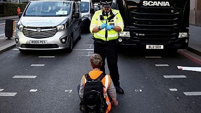 Climate change protesters defy court to block London routes
