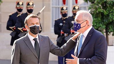 Macron says up to Australia to repair broken relations