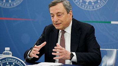 Italy's Draghi cuts taxes, raises retirement age in first budget