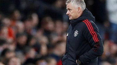Soccer-Solskajer hits out at "lies", says players together in the trenches