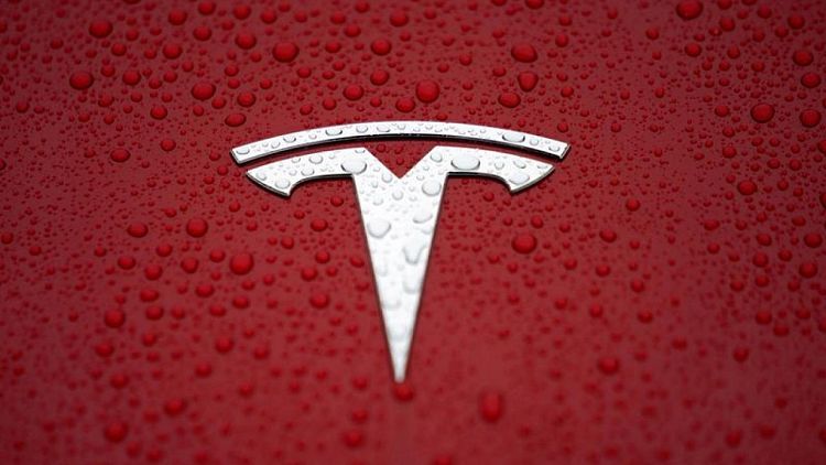 Current, former Tesla board members cash in on stock rally