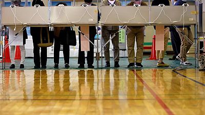 Japan coalition projected to keep majority, PM's party battered - NHK Japan coalition projected to keep majority, PM's party battered - NHK