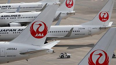 Japan Airlines narrows H1 loss on cost cuts, forecasts annual loss
