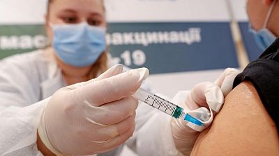 In vaccine-sceptic Ukraine, one spa town bucks trend