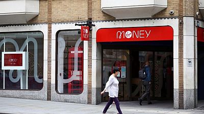 UK's Virgin Money revives dividend, targets cost savings