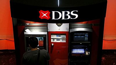 Singapore's DBS posts Q3 profit jump, banks flag recovery
