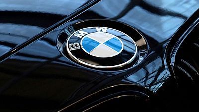 BMW cuts east German working hours to same as west