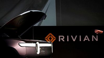 EV maker Rivian prices IPO above range to raise over $11.9 billion