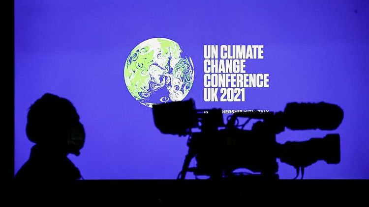 UK draft climate deal urges countries to step up climate goals