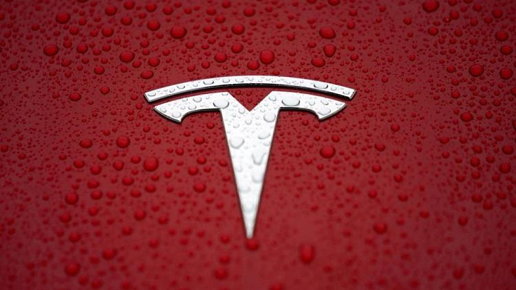 Tesla shares inch higher after Monday's sell-off