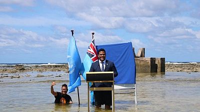 Tuvalu minister stands in sea to film COP26 speech to show climate change
