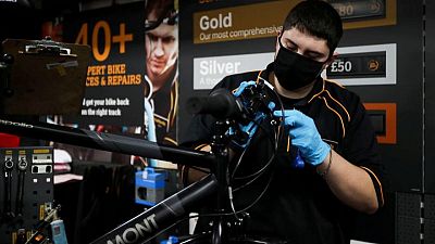 Cycle retailer Halfords lifts guidance, says supply snags easing
