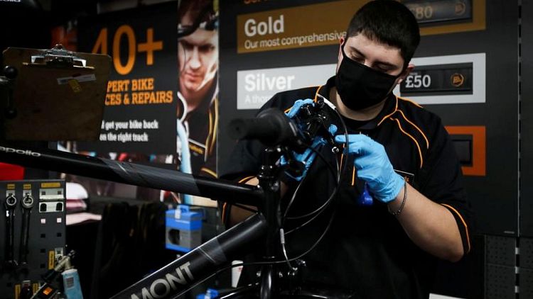 Cycle retailer Halfords lifts guidance, says supply snags easing