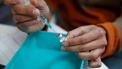 Health workers in England required to get COVID vaccine - minister
