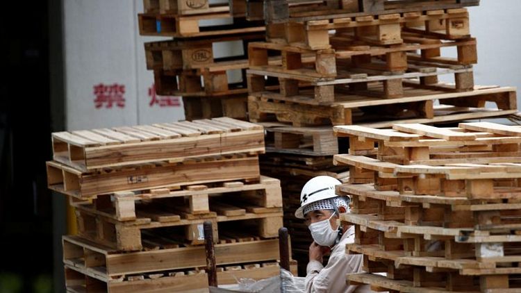 Japan manufacturers' mood falls to 7-month low in November - Reuters Tankan