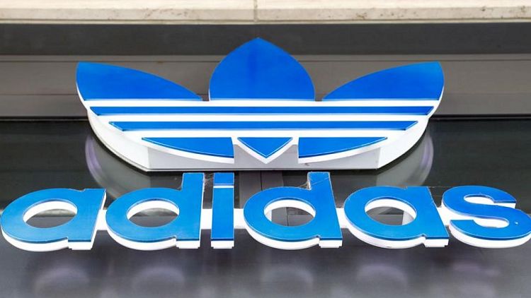 Adidas trims 2021 forecast on sourcing disruptions