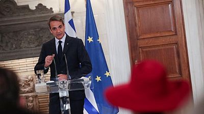 Greek PM defends migration policy in heated exchange with journalist Greek PM defends migration policy in heated exchange with journalist