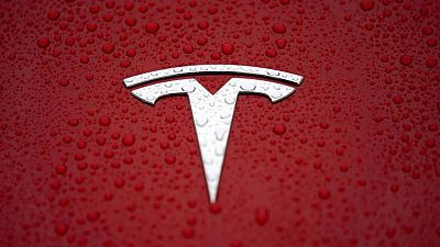 Tesla dips after Musk sheds $5 billion in shares