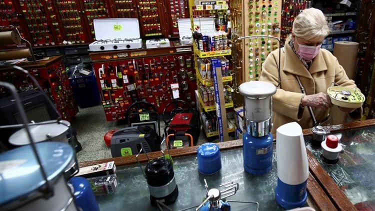 Blackout fears amid energy crunch boosts gas cookers, lantern sales in Spain